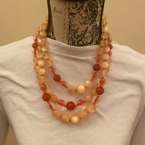 Triple strand coral acrylic necklace, gently worn , excellent condition
